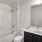 bathroom with toilet and shower tub