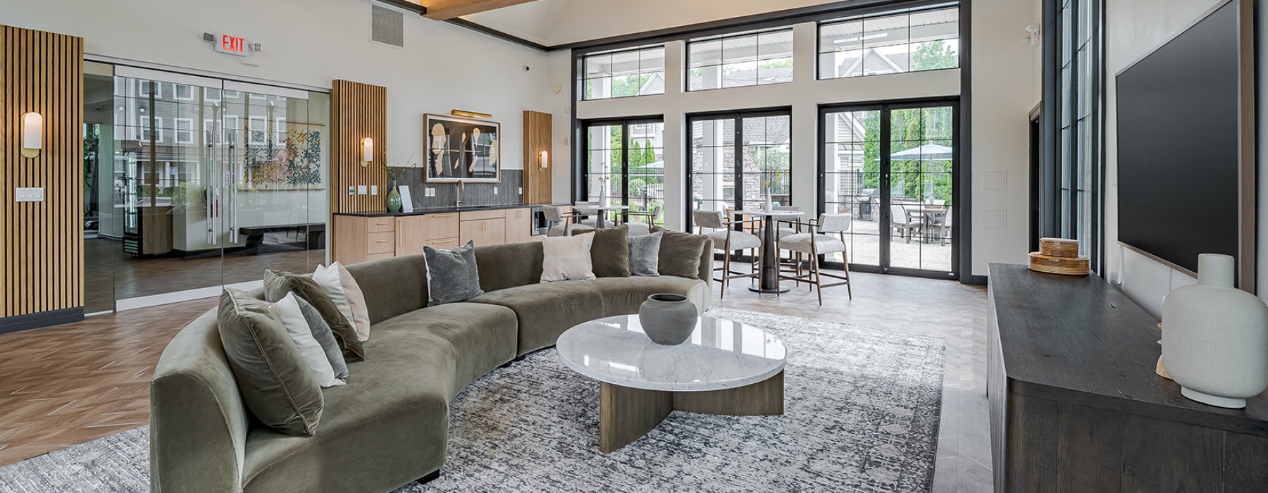 resident clubhouse with sectional couch and coffee table
