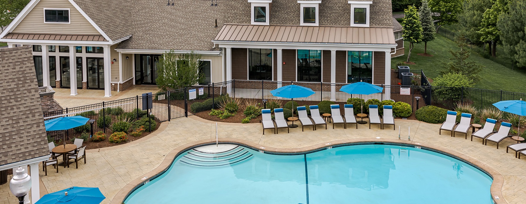 pool behind a house