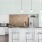 a kitchen with white cabinets