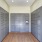 a room with grey mailboxes